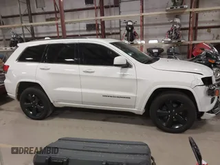 2015 Jeep Grand Cherokee Laredo with VIN 1C4RJFAG4FC747532, listed as a IAAI auction lot 41764541 with 196,385 mi miles. Bid and sale history available at carsss.com. Image 13.