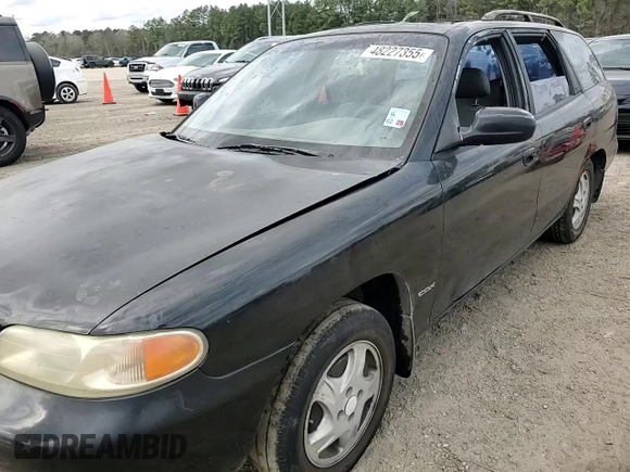 1999 Daewoo Nubira CDX z VIN KLAJB82Z5XK301054, wystawiony jako Copart lot #48227355 z przebiegiem 66 730 mil mil oraz Szkody całkowita. Historia ofert i sprzedaży dostępna na DreamBid. Obrazek 11.