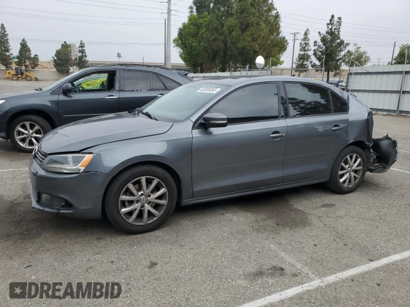 2012 Volkswagen Jetta SE with VIN 3VWDP7AJ5CM427654, listed as a Copart auction lot 60305055 with 138,222 mi miles and Salvage title. Bid and sale history available at DreamBid. Image 1.