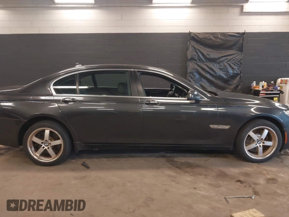 2011 BMW 7 Series 750Li xDrive with VIN WBAKC8C56BC433083, listed as a IAAI auction lot 42523890 with 120,977 mi miles and . Bid and sale history available at DreamBid. Image 14.