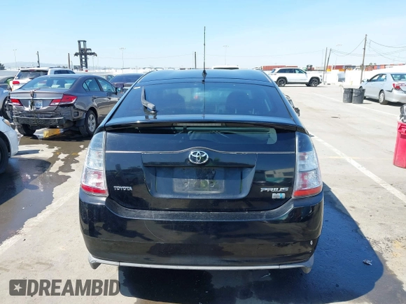 2005 Toyota Prius with VIN JTDKB20U853108017, listed as a IAAI auction lot 41848827 with 218,742 mi miles. Bid and sale history available at carsss.com. Image 16.