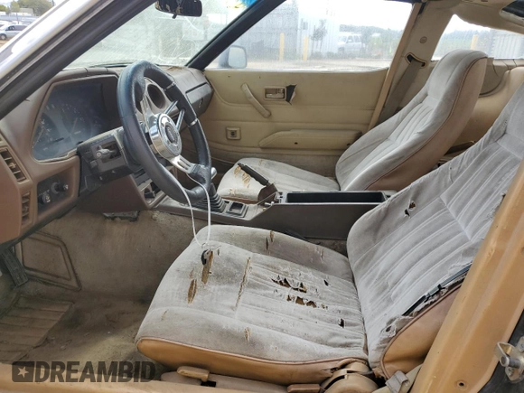 1981 Datsun 280ZX z VIN JN1HZ04S8BX265704, wystawiony jako Copart lot #49279325 z przebiegiem 251 218 mil mil oraz Tytuł czysty. Historia ofert i sprzedaży dostępna na DreamBid. Obrazek 7.