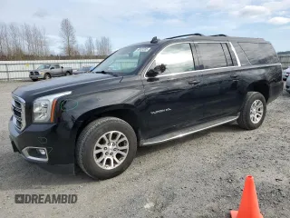 2016 GMC Yukon XL SLT with VIN 1GKS2GKC9GR312461, listed as a Copart auction lot 48431205 with 89,310 mi miles and Salvage Title. Bid and sale history available at carsss.com. Image 1.