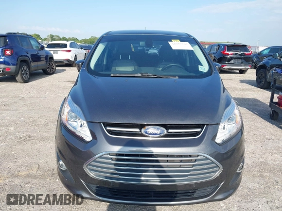 2017 Ford C-Max Energi Titanium with VIN 1FADP5FU9HL117693, listed as a IAAI auction lot 42059763 with 86,827 mi miles. Bid and sale history available at carsss.com. Image 6.