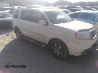 2012 Honda Pilot Touring with VIN 5FNYF3H92CB027292, listed as a IAAI auction lot 40617936 with 140,455 mi miles and . Bid and sale history available at carsss.com. Image 1.