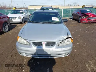2004 Pontiac Grand Am SE1 with VIN 1G2NF52E54M646874, listed as a IAAI auction lot 41564072 with 97,437 mi miles. Bid and sale history available at carsss.com. Image 12.