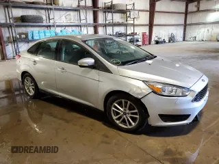 2016 Ford Focus SE z VIN 1FADP3F26GL247898, wystawiony jako Copart lot #57411665 z przebiegiem 134 708 mil mil oraz Czysty tytuł • Clean title. Historia ofert i sprzedaży dostępna na DreamBid. Obrazek 4.