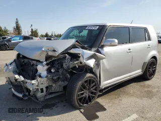 2012 Scion xB with VIN JTLZE4FE3C1143496, listed as a Copart auction lot 52157215 with 223,376 mi miles and Salvage Title. Bid and sale history available at carsss.com. Image 1.