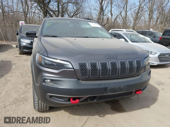 2022 Jeep Cherokee Trailhawk with VIN 1C4PJMBX4ND536592, listed as a IAAI auction lot 41792322 with 43,611 mi miles and . Bid and sale history available at DreamBid. Image 12.