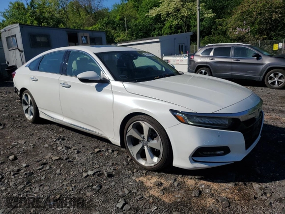 2020 Honda Accord Touring с VIN 1HGCV2F92LA029161, выставлен на аукционе Copart как лот 55549175 с пробегом 156 638 миль миль и Списание • Salvage title. История ставок и продаж доступна на DreamBid. Изображение 4.
