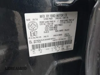 2014 Ford Edge SEL with VIN 2FMDK3JC2EBB19711, listed as a IAAI auction lot 40906115 with 125,027 mi miles. Bid and sale history available at carsss.com. Image 9.