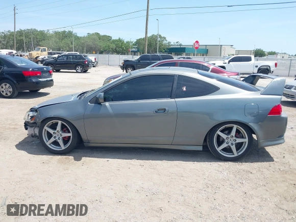 2005 Acura RSX z VIN JH4DC53885S010552, wystawiony jako IAAI lot #42086939 z przebiegiem 208 204 mil mil oraz . Historia ofert i sprzedaży dostępna na DreamBid. Obrazek 14.
