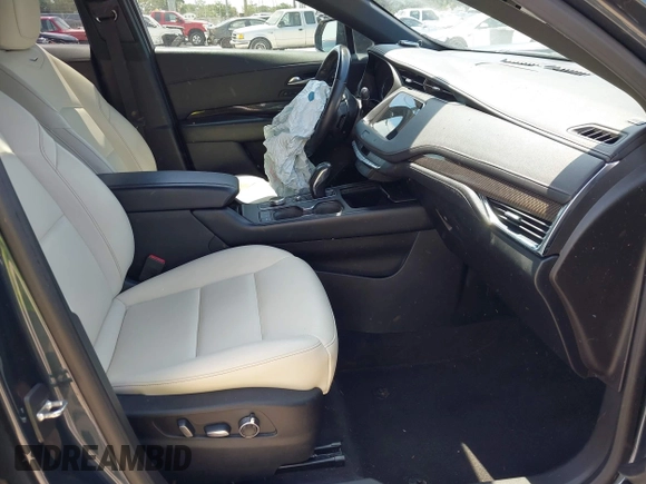 2019 Cadillac XT4 FWD Sport with VIN 1GYFZER42KF107032, listed as a IAAI auction lot 42193557 with 96,615 mi miles and . Bid and sale history available at DreamBid. Image 5.