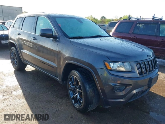 2015 Jeep Grand Cherokee Laredo with VIN 1C4RJFAGXFC631123, listed as a IAAI auction lot 41859251 with 201,558 mi miles. Bid and sale history available at carsss.com. Image 1.