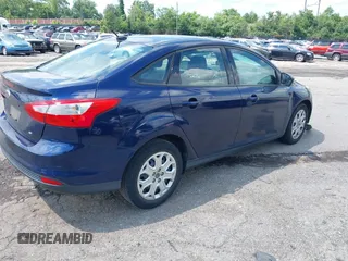 2012 Ford Focus SE z VIN 1FAHP3F22CL157417, wystawiony jako IAAI lot #42655527 z przebiegiem 107 472 mil mil oraz . Historia ofert i sprzedaży dostępna na DreamBid. Obrazek 4.