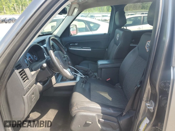 2012 Jeep Liberty Arctic with VIN 1C4PJMAK2CW131743, listed as a Copart auction lot 62406055 with 118,515 mi miles and Salvage title. Bid and sale history available at DreamBid. Image 7.