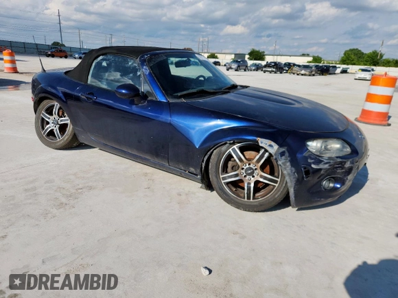 2007 Mazda MX-5 Miata Touring with VIN JM1NC25F770138120, listed as a Copart auction lot 60777425 with 184,029 mi miles and Salvage title. Bid and sale history available at DreamBid. Image 4.