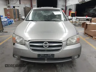 2002 Nissan Maxima GLE with VIN JN1DA31D32T422365, listed as a IAAI auction lot 41644137 with 165,157 mi miles and . Bid and sale history available at DreamBid. Image 12.