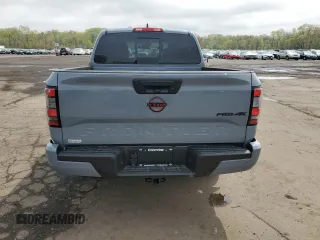 2023 Nissan Frontier Pro-4X with VIN 1N6ED1EK4PN672714, listed as a Copart auction lot 55557855 with 4,678 mi miles and Salvage title. Bid and sale history available at DreamBid. Image 6.
