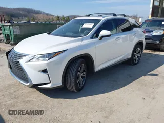 2016 Lexus RX 450h with VIN 2T2BGMCAXGC004844, listed as a IAAI auction lot 41791066 with 100,604 mi miles and . Bid and sale history available at DreamBid. Image 2.