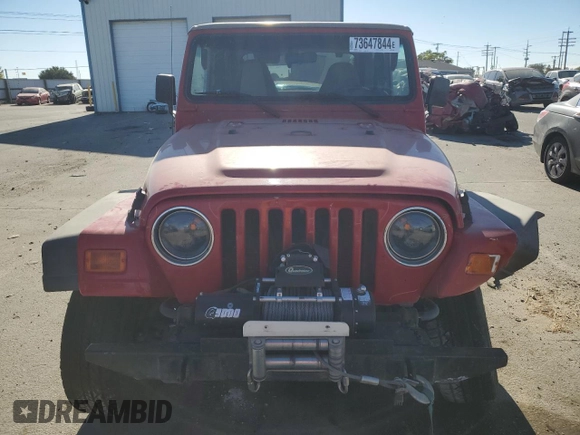 2000 Jeep Wrangler Sport with VIN 1J4FA49S1YP703560, listed as a Copart auction lot 73647844 with 117,300 mi miles and Salvage Title. Bid and sale history available at carsss.com. Image 5.