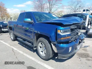 2017 Chevrolet Silverado 1500 LT with VIN 1GCVKREC6HZ312970, listed as a IAAI auction lot 41978950 with 104,239 mi miles and . Bid and sale history available at DreamBid. Image 1.