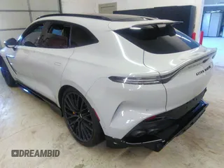 2023 Aston Martin DBX 707 z VIN SD7VUJBW2PTV05712, wystawiony jako IAAI lot #40673188 z przebiegiem 4702 mil mil oraz . Historia ofert i sprzedaży dostępna na DreamBid. Obrazek 3.