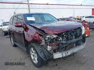 2011 Lexus GX 460 with VIN JTJBM7FXXB5022326, listed as a IAAI auction lot 41830166 with 180,976 mi miles. Bid and sale history available at carsss.com. Image 1.