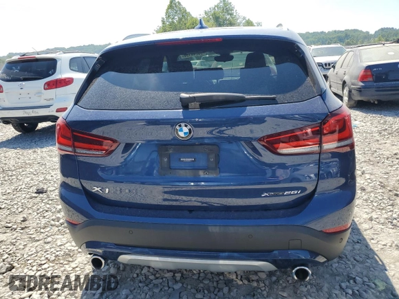 2021 BMW X1 xDrive28i with VIN WBXJG9C01M5T94314, listed as a Copart auction lot 60244134 with 43,933 mi miles and Salvage title. Bid and sale history available at DreamBid. Image 6.