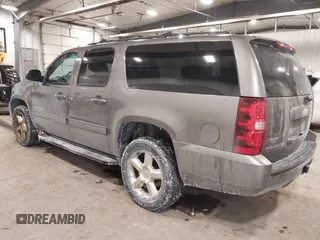 2013 Chevrolet Suburban LT with VIN 1GNSKJE76DR375916, listed as a IAAI auction lot 41588724 with 281,808 mi miles. Bid and sale history available at carsss.com. Image 3.