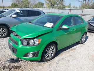 2014 Chevrolet Sonic LT with VIN 1G1JC5SB2E4227125, listed as a IAAI auction lot 40667083 with 108,963 mi miles. Bid and sale history available at carsss.com. Image 2.