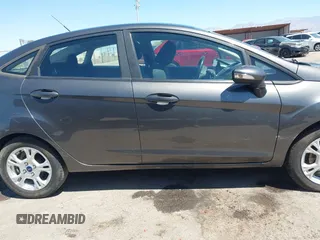 2015 Ford Fiesta SE with VIN 3FADP4BJ1FM217045, listed as a IAAI auction lot 42120444 with 119,207 mi miles and . Bid and sale history available at DreamBid. Image 14.