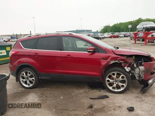 2015 Ford Escape Titanium with VIN 1FMCU9J96FUC02177, listed as a IAAI auction lot 42312928 with 100,716 mi miles and . Bid and sale history available at DreamBid. Image 13.