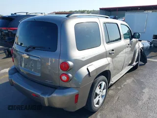 2011 Chevrolet HHR LS z VIN 3GNBAAFW9BS607895, wystawiony jako IAAI lot #42029086 z przebiegiem 98 149 mil mil oraz . Historia ofert i sprzedaży dostępna na DreamBid. Obrazek 4.