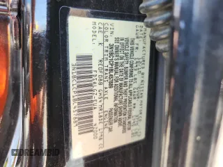 2011 Nissan Versa S with VIN 3N1BC1CP1BL457889, listed as a Copart auction lot 63414385 with 120,303 mi miles and Salvage title. Bid and sale history available at DreamBid. Image 12.