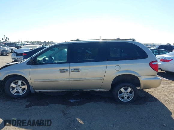 2005 Dodge Caravan SXT with VIN 2D8GP44L05R459369, listed as a IAAI auction lot 42638057 with 76,777 mi miles and . Bid and sale history available at DreamBid. Image 14.