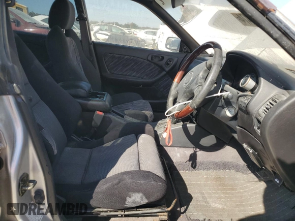 1998 Subaru Legacy with VIN BG5284959, listed as a Copart auction lot 75195474 with 169,830 mi miles and Non repairable. Bid and sale history available at DreamBid. Image 7.