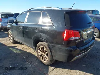 2012 Kia Sorento SX with VIN 5XYKW4A25CG212020, listed as a IAAI auction lot 41456930 with 214,368 mi miles. Bid and sale history available at carsss.com. Image 3.