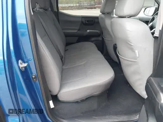 2018 Toyota Tacoma SR5 with VIN 3TMAZ5CNXJM069212, listed as a IAAI auction lot 42010564 with 73,825 mi miles and . Bid and sale history available at DreamBid. Image 8.