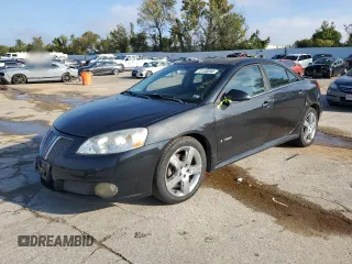 2009 Pontiac G6 GXP 1SA with VIN 1G2ZM577194221371, listed as a Copart auction lot 73138094 with 101,835 mi miles and Salvage title. Bid and sale history available at DreamBid. Image 1.