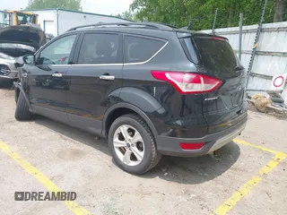 2013 Ford Escape SE with VIN 1FMCU0GX0DUC64074, listed as a IAAI auction lot 42419711 with 91,808 mi miles and . Bid and sale history available at DreamBid. Image 3.