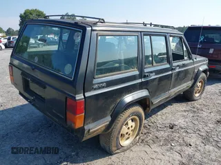 1990 Jeep Cherokee with VIN 1J4FJ38L1LL100497, listed as a IAAI auction lot 37253812 with 214,943 mi miles and . Bid and sale history available at DreamBid. Image 4.