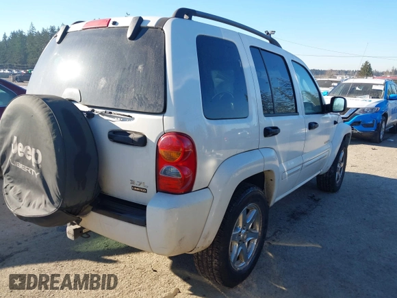 2004 Jeep Liberty Limited with VIN 1J8GL58K34W214825, listed as a IAAI auction lot 41456625 with 210,346 mi miles. Bid and sale history available at carsss.com. Image 4.