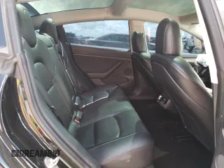 2023 Tesla Model 3 with VIN 5YJ3E1EA6PF454254, listed as a Copart auction lot 56881355 with 30,327 mi miles and Salvage title. Bid and sale history available at DreamBid. Image 10.