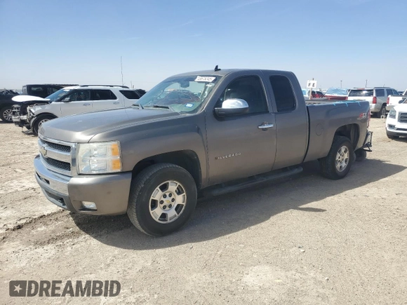2011 Chevrolet Silverado 1500 LT with VIN 1GCRKSE33BZ332402, listed as a Copart auction lot 48675245 with 128,322 mi miles and Salvage Title. Bid and sale history available at DreamBid. Image 1.