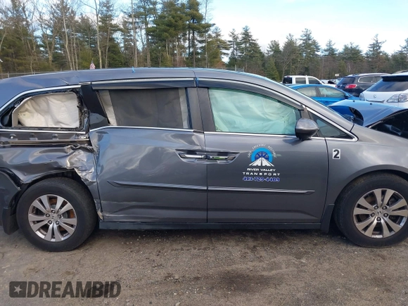 2014 Honda Odyssey EX-L with VIN 5FNRL5H67EB073640, listed as a IAAI auction lot 41115124 with 99,841 mi miles and . Bid and sale history available at carsss.com. Image 13.