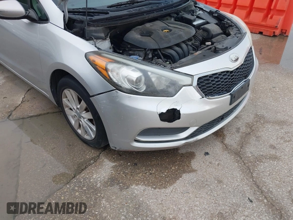 2014 Kia Forte LX with VIN KNAFX4A63E5099825, listed as a IAAI auction lot 42119316 with 174,551 mi miles and . Bid and sale history available at carsss.com. Image 6.