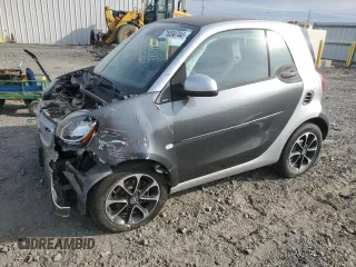 2016 Smart fortwo Passion z VIN WMEFJ5DA1GK064460, wystawiony jako Copart lot #71034744 z przebiegiem 23 797 mil mil oraz Szkoda całkowita • Salvage title. Historia ofert i sprzedaży dostępna na DreamBid. Obrazek 1.