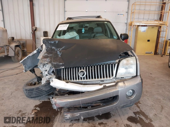 2005 Mercury Mountaineer Convenience z VIN 4M2ZU86E35UJ14209, wystawiony jako IAAI lot #42172836 z przebiegiem 216 964 mil mil oraz . Historia ofert i sprzedaży dostępna na DreamBid. Obrazek 12.