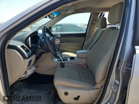 2017 Jeep Grand Cherokee Laredo with VIN 1C4RJEAG0HC816410, listed as a Copart auction lot 52909905 with 102,326 mi miles and Salvage title. Bid and sale history available at DreamBid. Image 7.